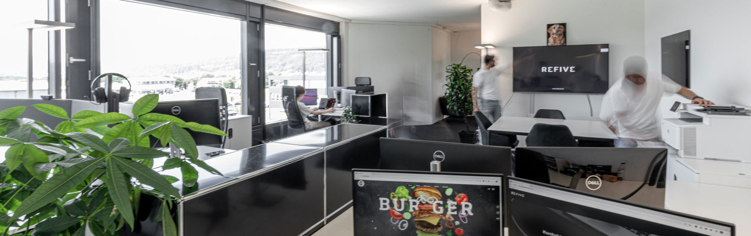 Cramped modest office space, the early collaborative workspace at REFIVE, where a small team of five laid the foundation for our industry strides.